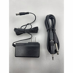 Phenyx Pro power adapter and quarter-inch audio cable