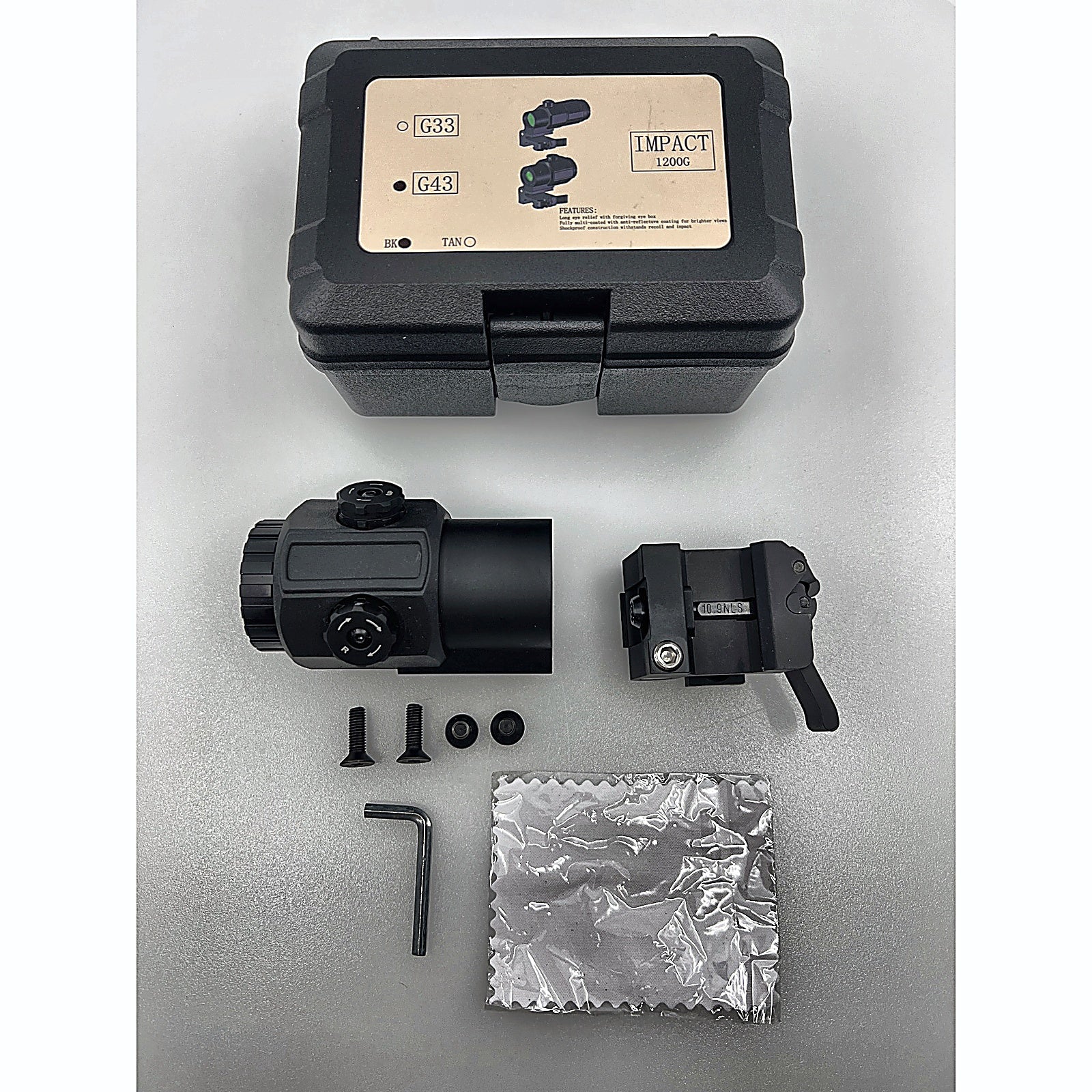 Gotical 4X Magnifier Scope with QD Mount hard case and accessories laid out
