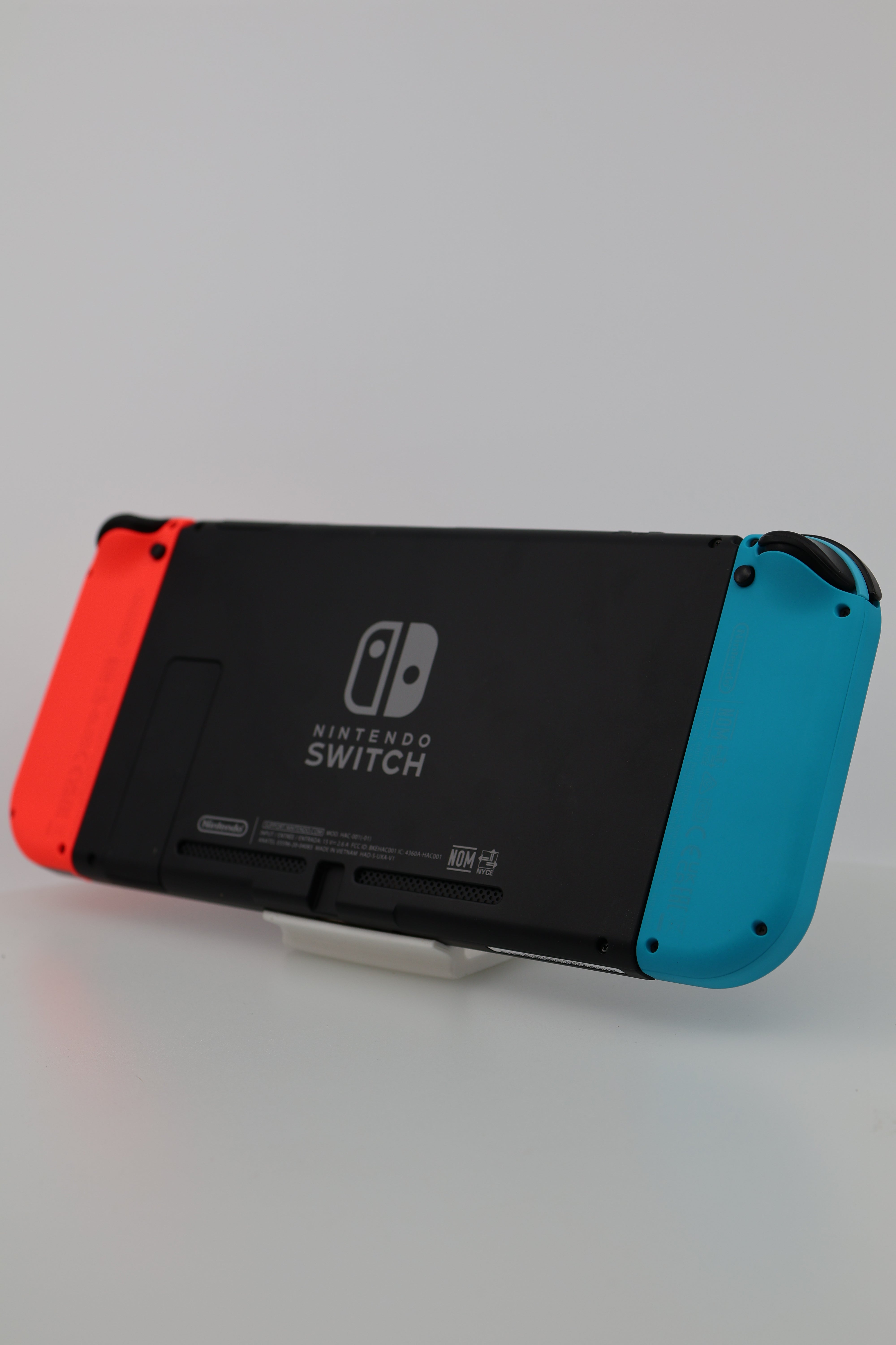 Nintendo Switch with Neon Blue and Neon Red Joy-Con