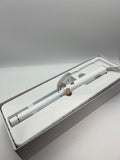 white and rose gold curling iron