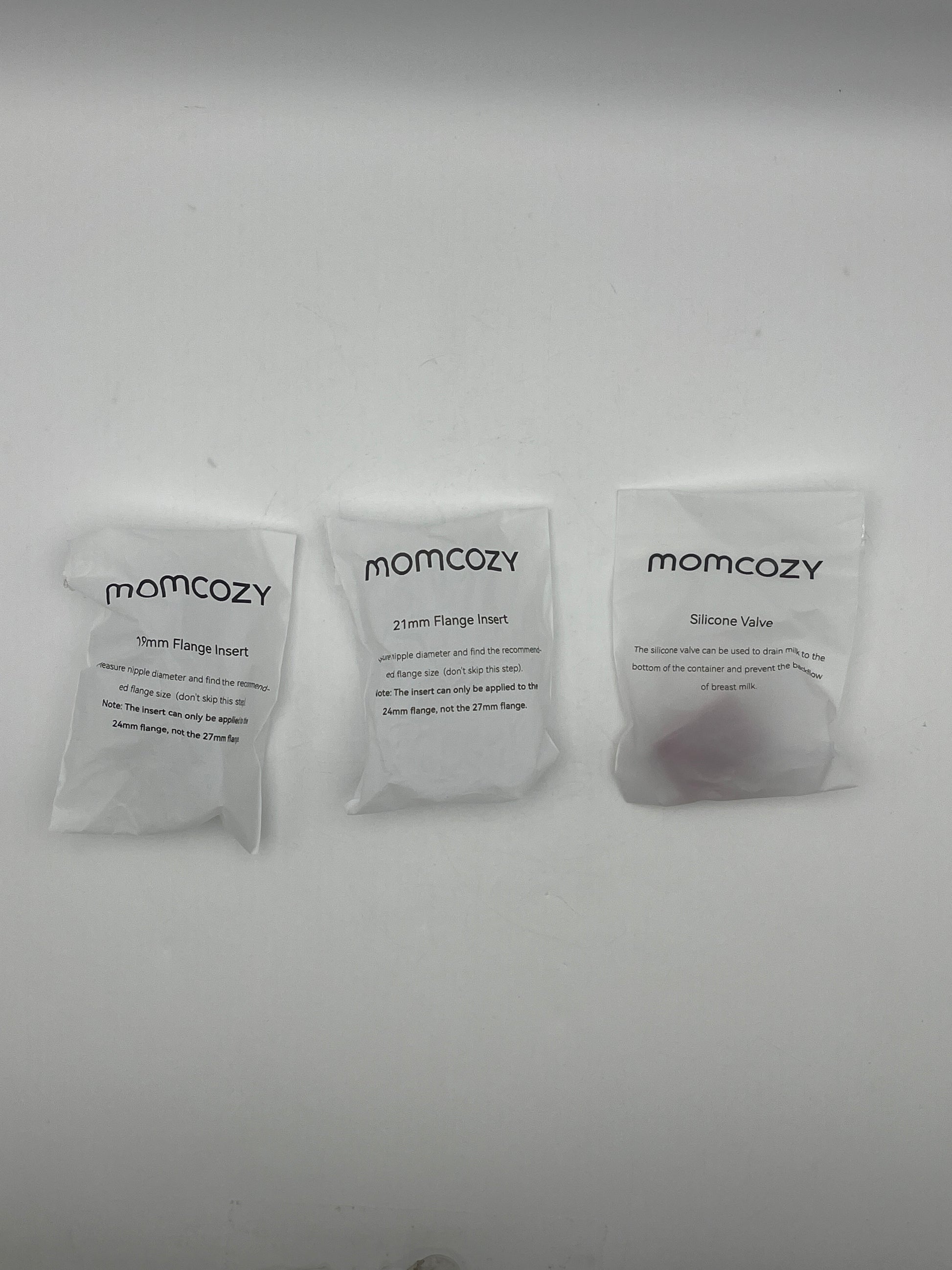 Momcozy M6 Breast Pump showing LED display