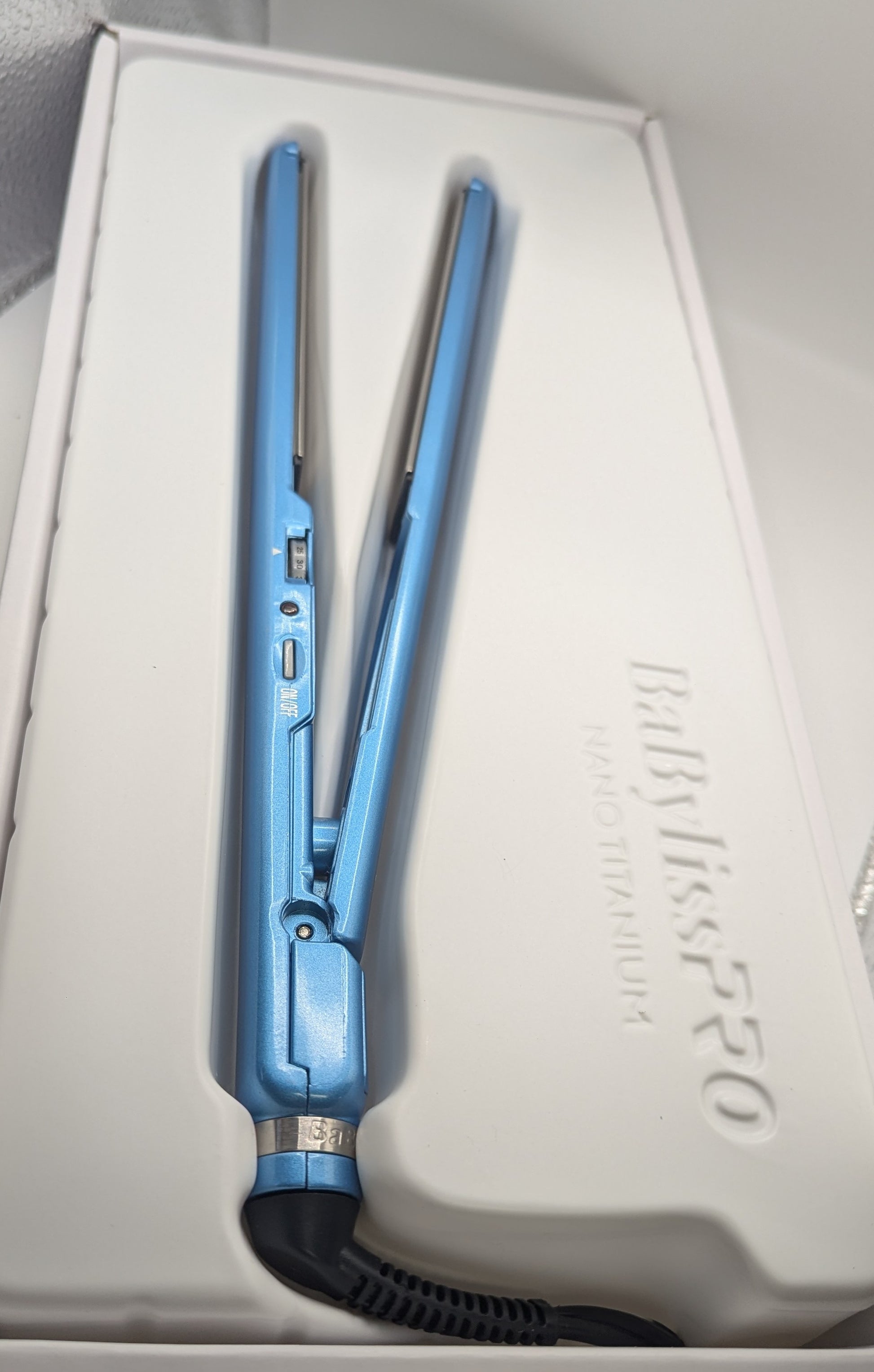 BaBylissPRO Nano Titanium Flat Iron in use