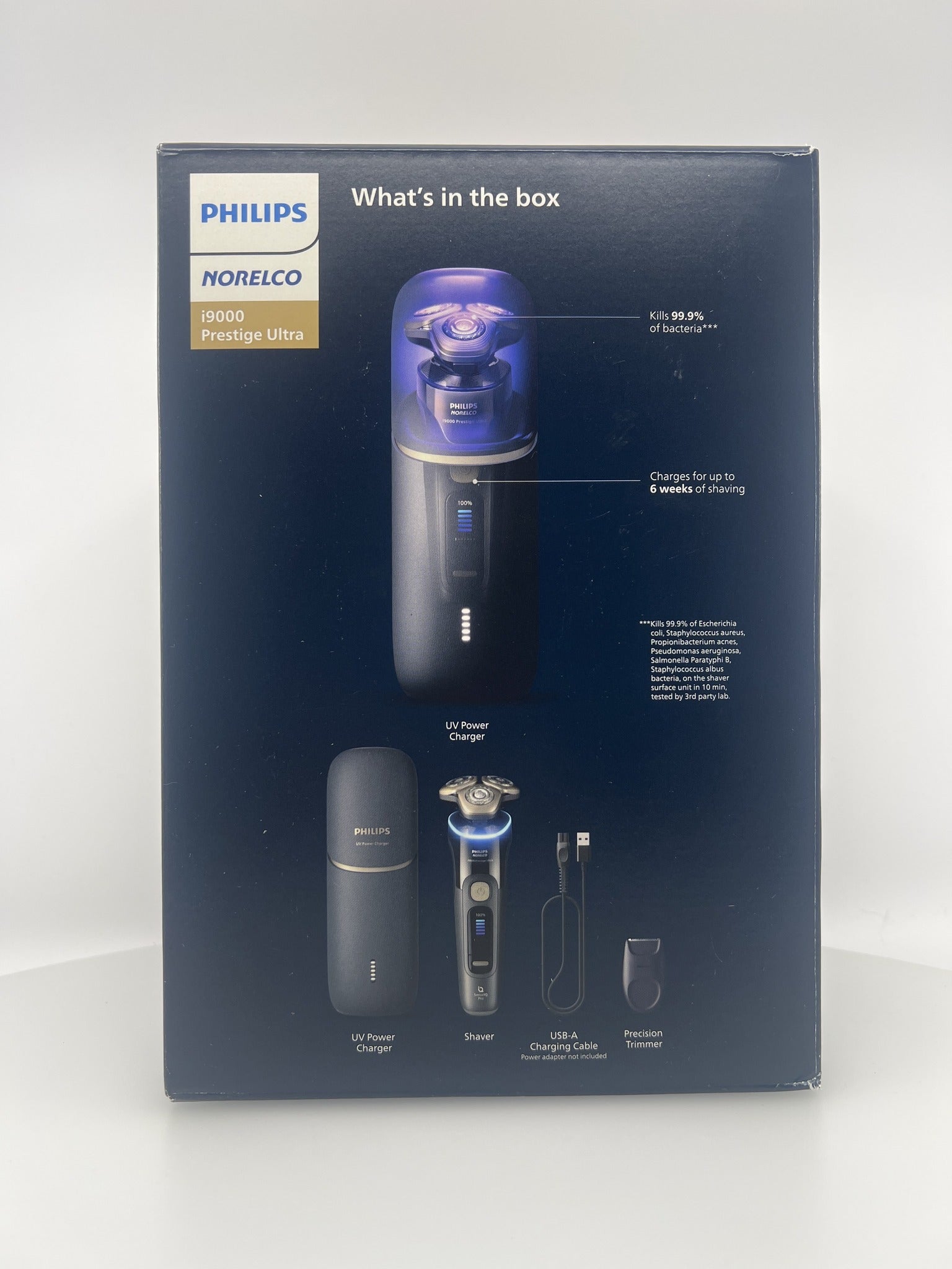 Norelco i9000 Prestige Ultra retail box side with what's in the box