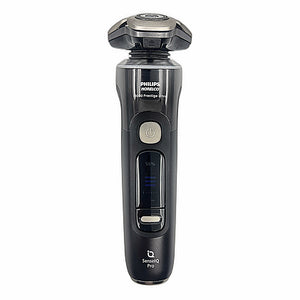 Norelco i9000 Prestige Ultra shaver seated in UV power charger dock