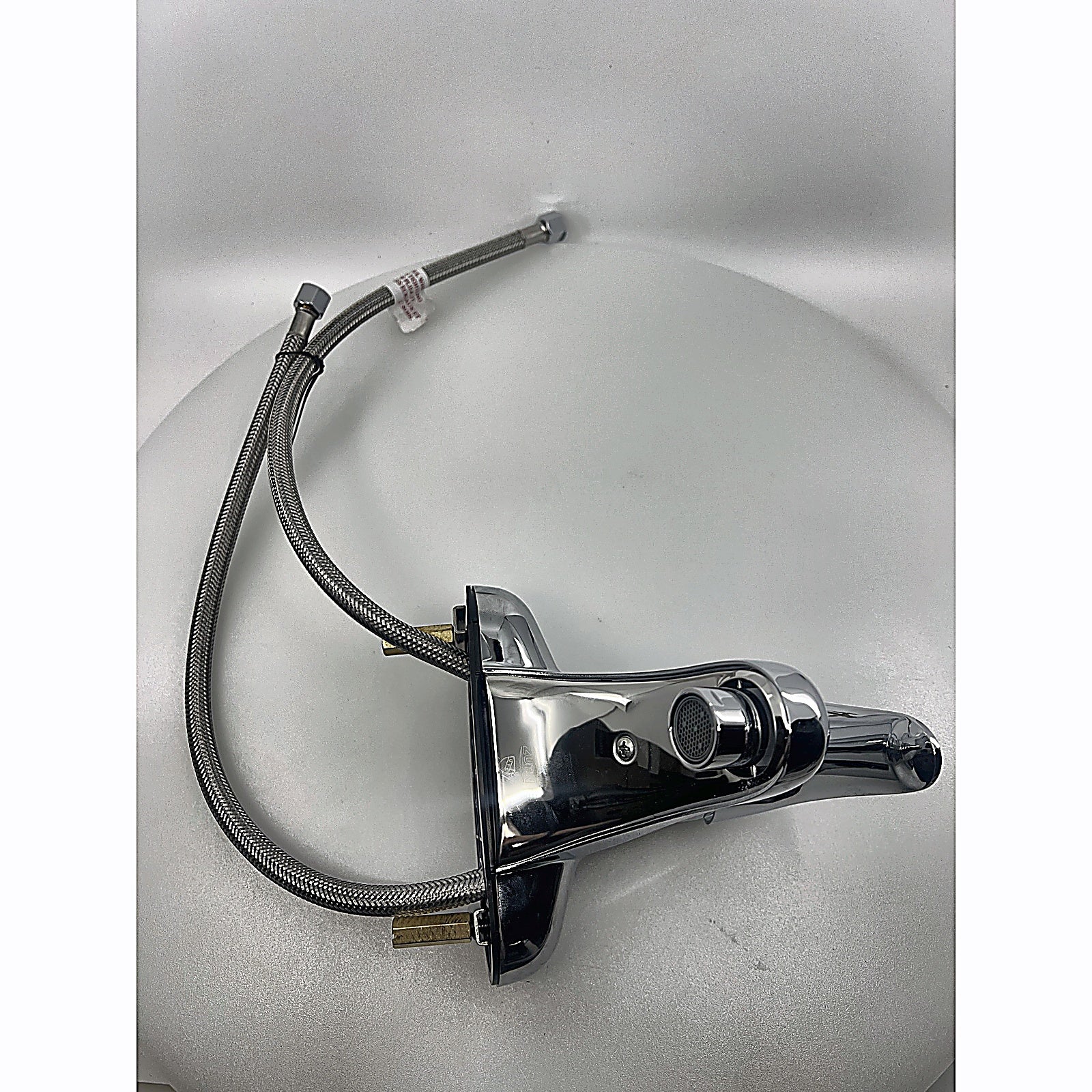 Zurn Z7440-XL chrome faucet with braided supply line angled view