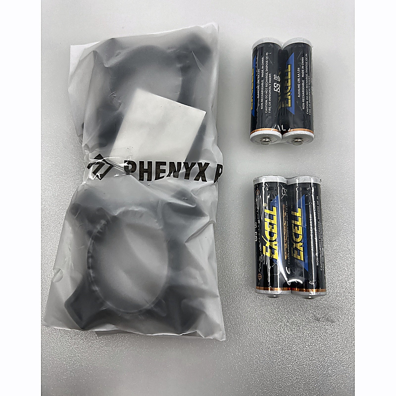 Phenyx Pro wireless mic accessories bag and AA batteries