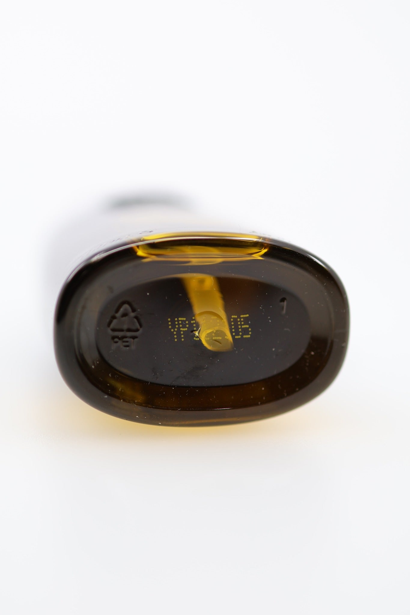 Oribe Gold Lust Hair Oil bottle base