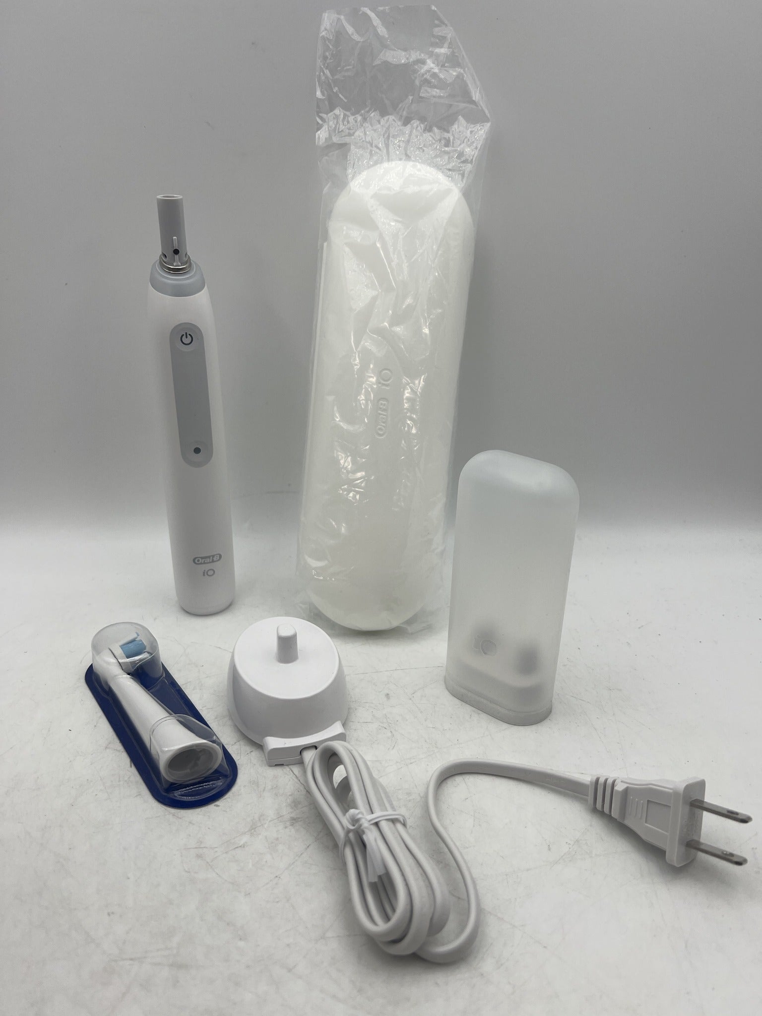 Oral-B iO Series 3 toothbrush full contents laid out