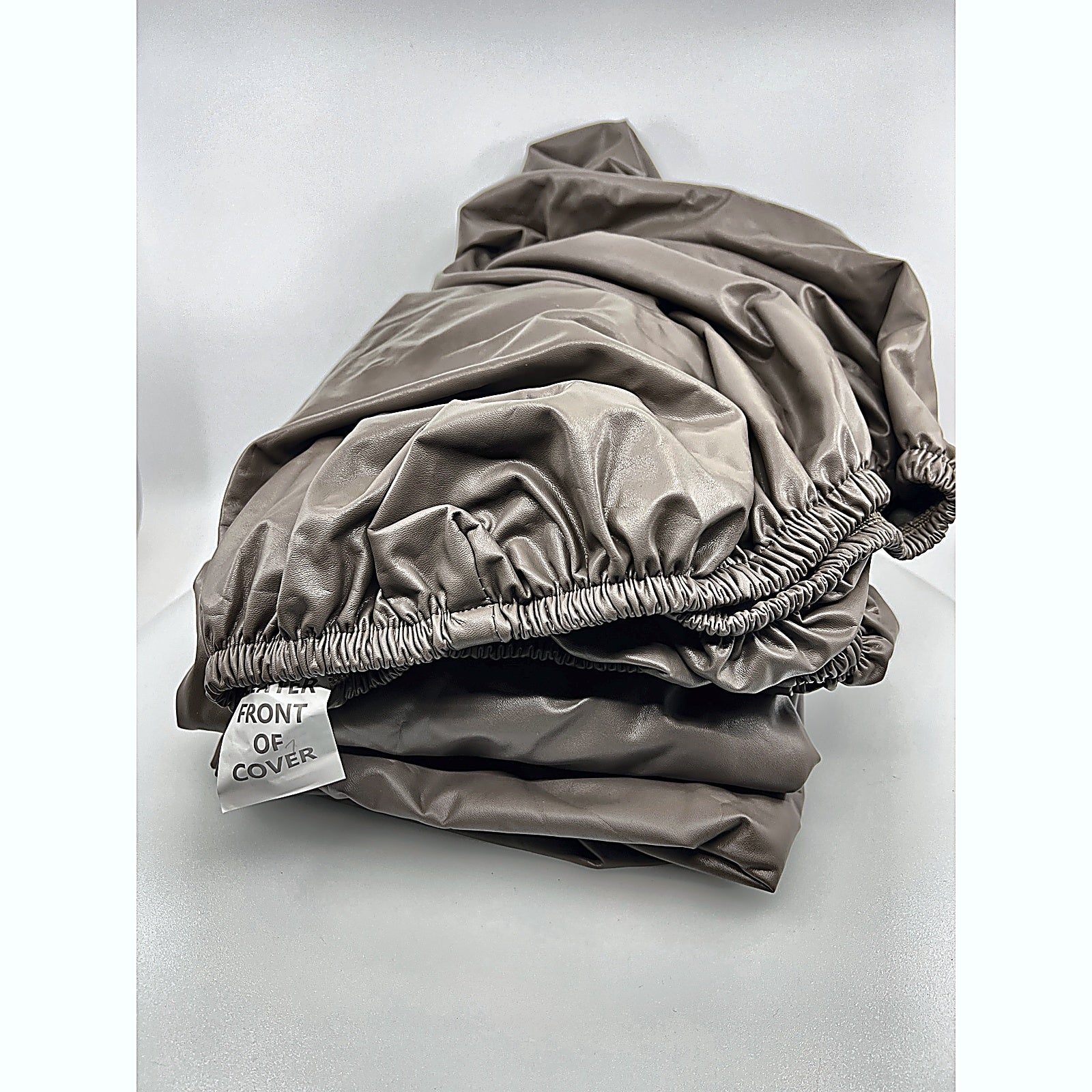 vctops sofa slipcover folded showing elastic front of cover