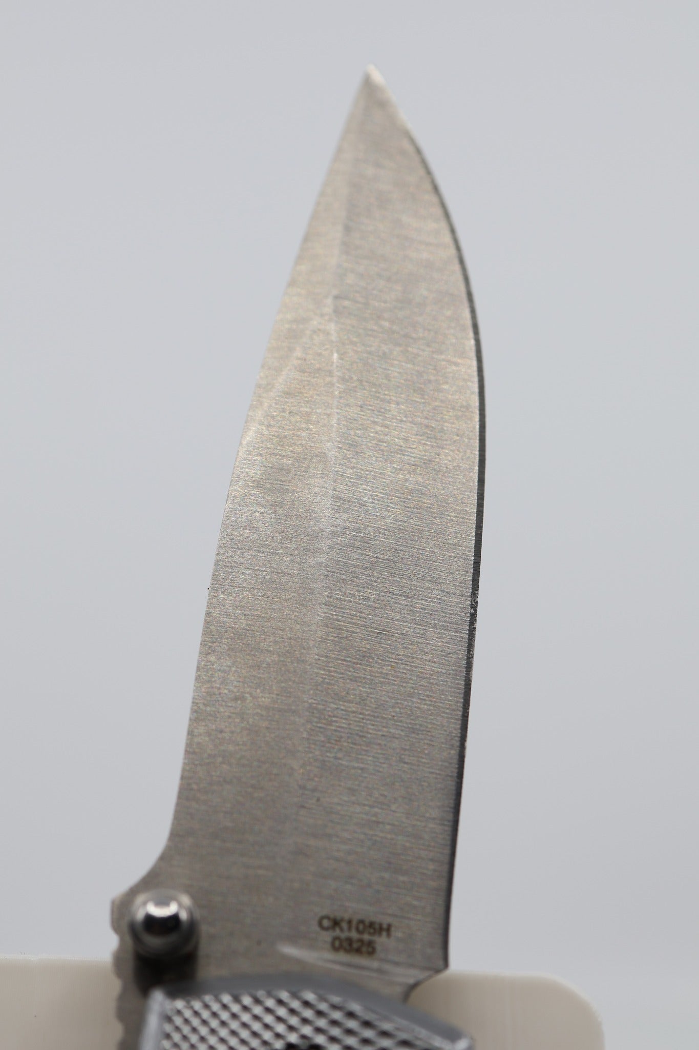 Smith & Wesson Extreme Ops CK105H blade reverse showing model stamp