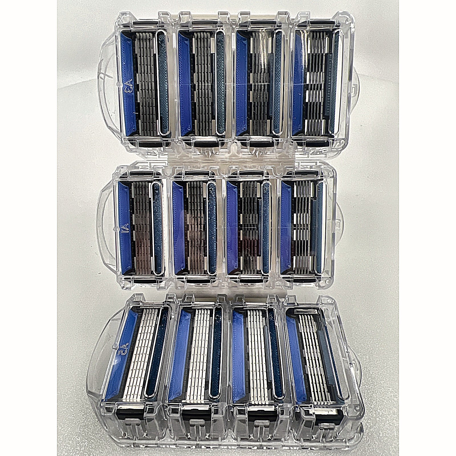 Amazon Basics 5-Blade Razor Refills 12-Pack cartridges in trays front view