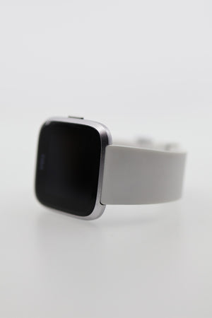 Fitbit Versa Lite Smart Watch angled front view