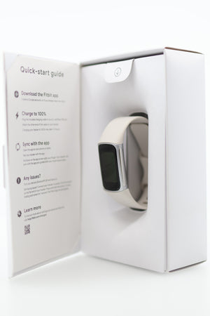 Fitbit Charge 6 open box quick start guide and tracker